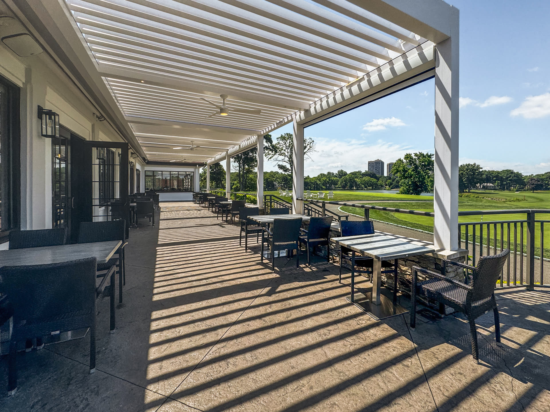 Detail of the Lake Success Country Club louvered roof and seating
