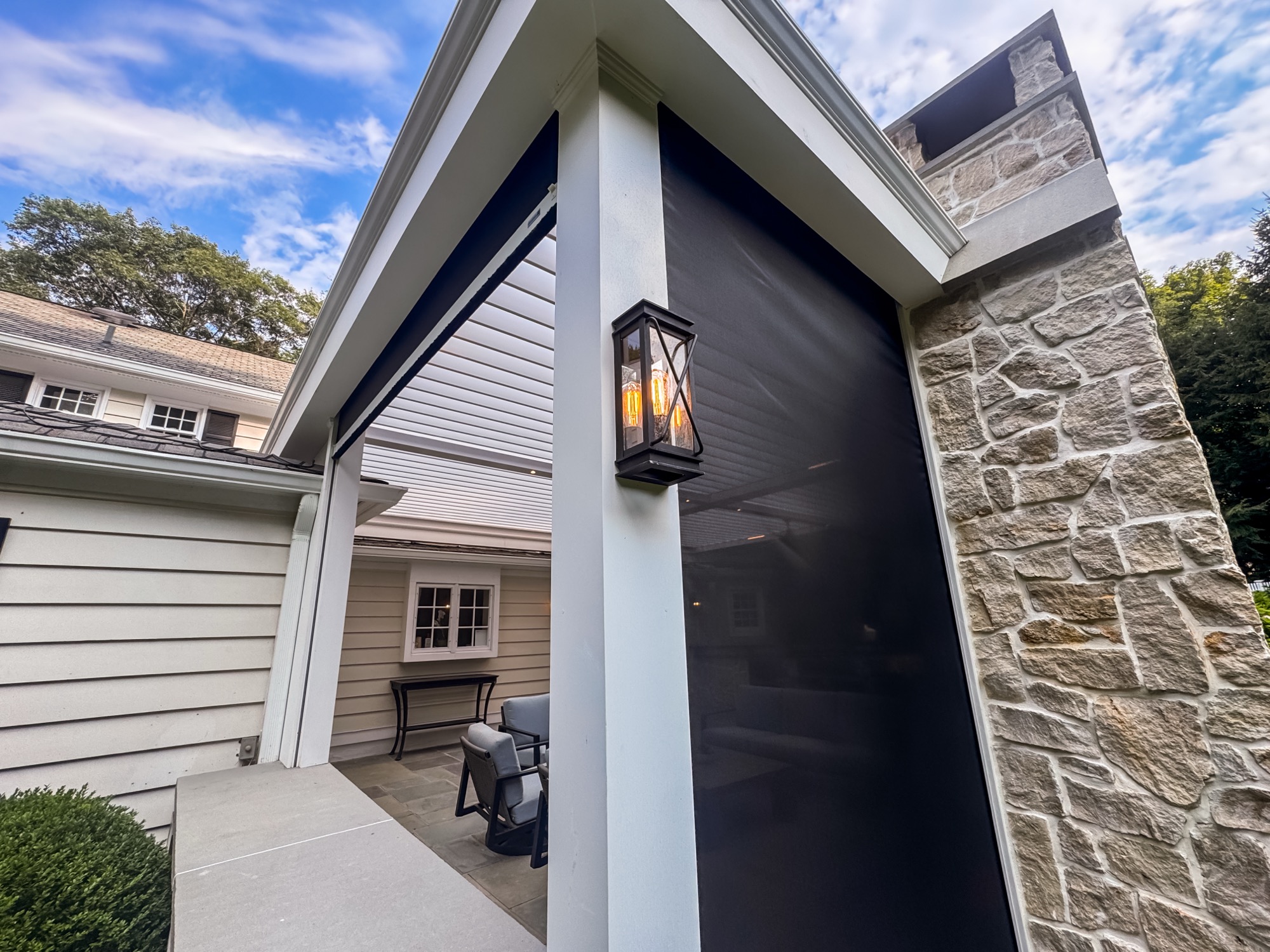 Close-up of custom Azek PVC column wrapping with carriage lantern fixture