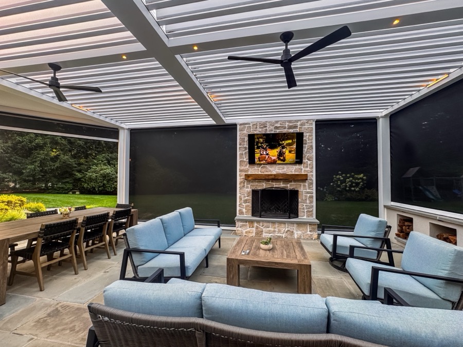 Screened outdoor room with motorized shades