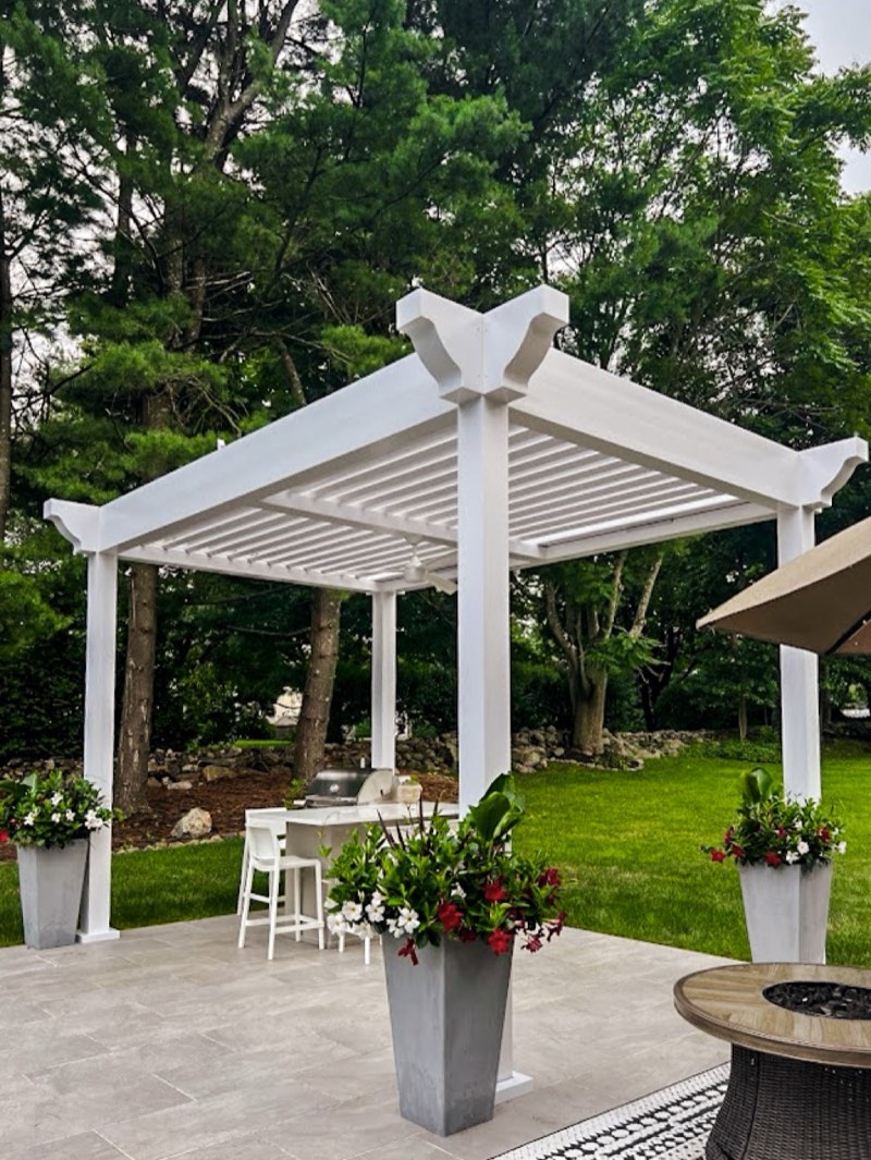Classic style louvered pergola with traditional proportions and wrapped posts